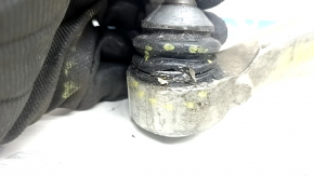 Tesla Model X 22-25 lower left front control arm has a torn boot.