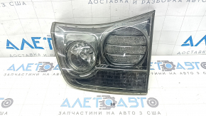 Right inner trunk lid light for a Lexus RX350 RX400h 06-08 restyling, dark, water damage, peeling chrome, broken guide