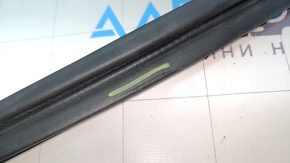 The rubber seal on the tailgate of a Nissan Rogue Sport 17-22 is worn out.