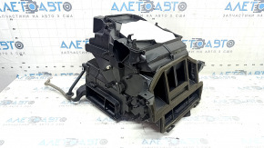 The bare heater housing of the Hyundai Tucson 19-21 manual air conditioner under dry shade