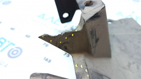 The lower radiator deflector on a Honda Clarity 18-21 USA is torn.