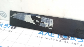 Tesla Model X 22-25 lower front right door trim is worn, glue is missing