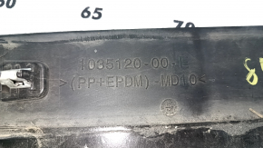 Tesla Model X 22-25 lower front right door trim is worn, glue is missing