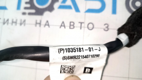 The right side mirror assembly for a Tesla Model X 22-25 is worn and scratched.