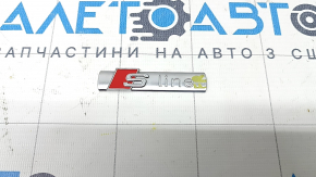 S-Line emblem on the front right wing of the Audi A6 C8 19-25