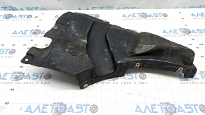 The front left fender liner, lower part, BMW X5 G05 19-24, is dented.
