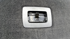 The trunk floor of a BMW X3 F25 11-17 is black and has an organizer. The handle is broken and there are scratches on the handle.