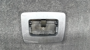 The trunk floor of a BMW X3 F25 11-17 is black and has an organizer. The handle is broken and there are scratches on the handle.