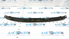 The front center hood seal for an Audi A6 C8 19-24 has broken fasteners.