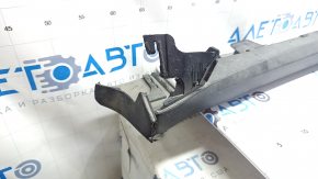 The left door sill of a Tesla Model X 22-25 is worn, cracked, the fastener is torn, there are no plugs, and there are scratches.