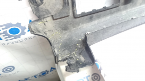 The left door sill of a Tesla Model X 22-25 is worn, cracked, the fastener is torn, there are no plugs, and there are scratches.