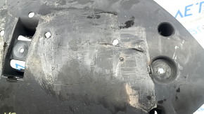 The rear lower control arm trim, right BMW X5 G05 19-24, is torn and dented.