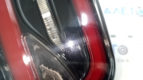 The left inner tailgate light on a Tesla Model X 22-25 is worn.