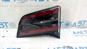 The right inner tailgate light for the Tesla Model X 22-25 is worn.