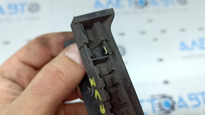 The front right lower door seal for an Audi A6 C8 19-21 has broken fasteners.