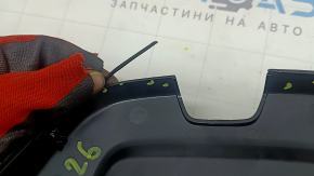 The interior mirror cover for the Audi A6 C8 19-25 is black, worn, the mount is broken, the seal is peeling off