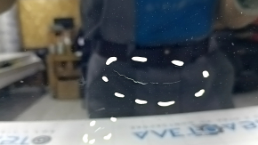 The front panoramic glass of the Audi A6 C8 19-24 has cracked coating, sand, and scratches.