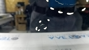 The front panoramic glass of the Audi A6 C8 19-24 has cracked coating, sand, and scratches.