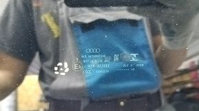 The front panoramic glass of the Audi A6 C8 19-24 has cracked coating, sand, and scratches.