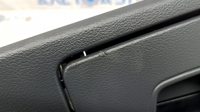 The driver's knee pad for the Audi A6 C8 19-21 is dark gray and the coating is bulging.