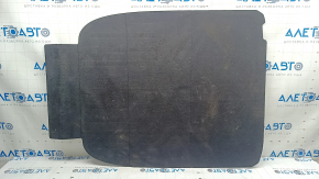 The trunk floor of a 2023-2024 Honda Accord is black and has tears in it. It needs cleaning.