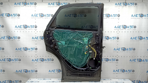 Rear left door assembly for a Lexus RX450h 10-15 hybrid, tinted, blue 214, dents, bumps, and soot.