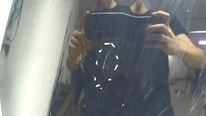 The hood of a Ford Escape MK3 2017-2019 is bare and black, with scratches and scuffs.