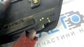 The lower inner front right door trim for the Lexus RX350 RX450h 10-15 has broken fasteners.