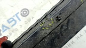 The lower inner front right door trim for the Lexus RX350 RX450h 10-15 has broken fasteners.
