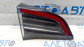Tesla Model 3 18-Type 2 inner trunk lid light, left, scratches