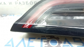 Tesla Model 3 18 right trunk lid interior light, type 2 scratches