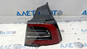 Tesla Model 3 18-USA right outer fender light, 3 pins, missing glass and housing fragments, crack