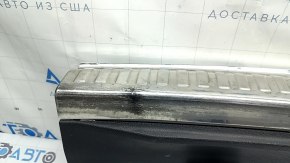 Audi Q3 83A 19-25 trunk opening trim, black with chrome, scuffs on chrome and plastic, broken fastener