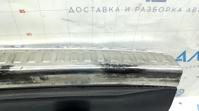 Audi Q3 83A 19-25 trunk opening trim, black with chrome, scuffs on chrome and plastic, broken fastener
