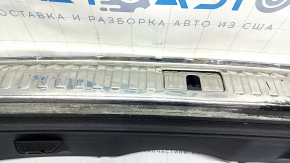 Audi Q3 83A 19-25 trunk opening trim, black with chrome, scuffs on chrome and plastic, broken fastener