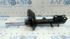 Rusty rear left shock absorber for a Lexus RX400h 06-07