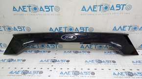 Upper trunk door molding with Ford Escape MK3 emblem, 17-16 rest, black, under the camera, broken fastener, glued