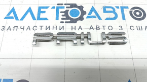 The "PRIUS" emblem on the trunk door of a Toyota Prius 50 19-22 has a broken guide.