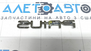 The "PRIUS" emblem on the trunk door of a Toyota Prius 50 19-22 has a broken guide.
