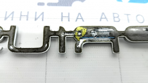 The "PRIUS" emblem on the trunk door of a Toyota Prius 50 19-22 has a broken guide.