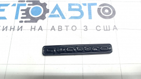 QUATTRO emblem on the tailgate of the Audi Q3 83A 19-25, glossy black
