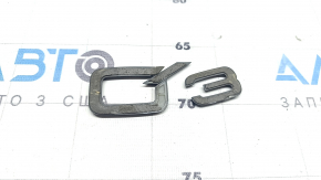 Q3 emblem on the tailgate of the Audi Q3 83A 19-25, glossy black