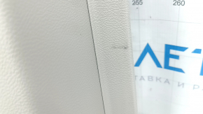Front left door panel for a Chrysler Pacifica 17-20, gray with brown leather, brown leather armrest, with overlays, with a handle, scratches, scuffs, needs cleaning