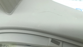 Lower left fender trim for Chrysler Pacifica 17-24, rear section under spare tire, gray, scratches, scuffs, needs dry cleaning, tear