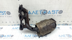 The rear exhaust manifold with a catalytic converter for a Lexus RX400h 2006-2008 is rusty, with protection, and the stud is cut off.