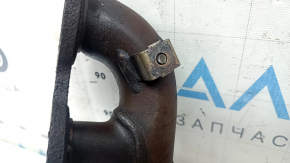 The rear exhaust manifold with a catalytic converter for a Lexus RX400h 2006-2008 is rusty, with protection, and the stud is cut off.