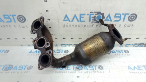 The front exhaust manifold with a catalytic converter for a Lexus RX400h 06-09 is rusty and has a broken stud.