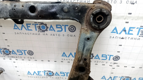 The front subframe of a Lexus RX400h 06-09 is rusty, with microcracks in 4 S/B