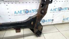 The front subframe of a Lexus RX400h 06-09 is rusty, with microcracks in 4 S/B