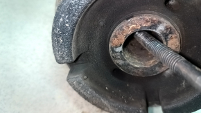 The front subframe of a Lexus RX400h 06-09 is rusty, with microcracks in 4 S/B